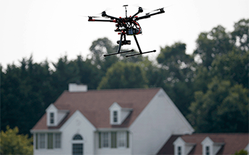 Drone-Flies-In-Urban-Area-AP