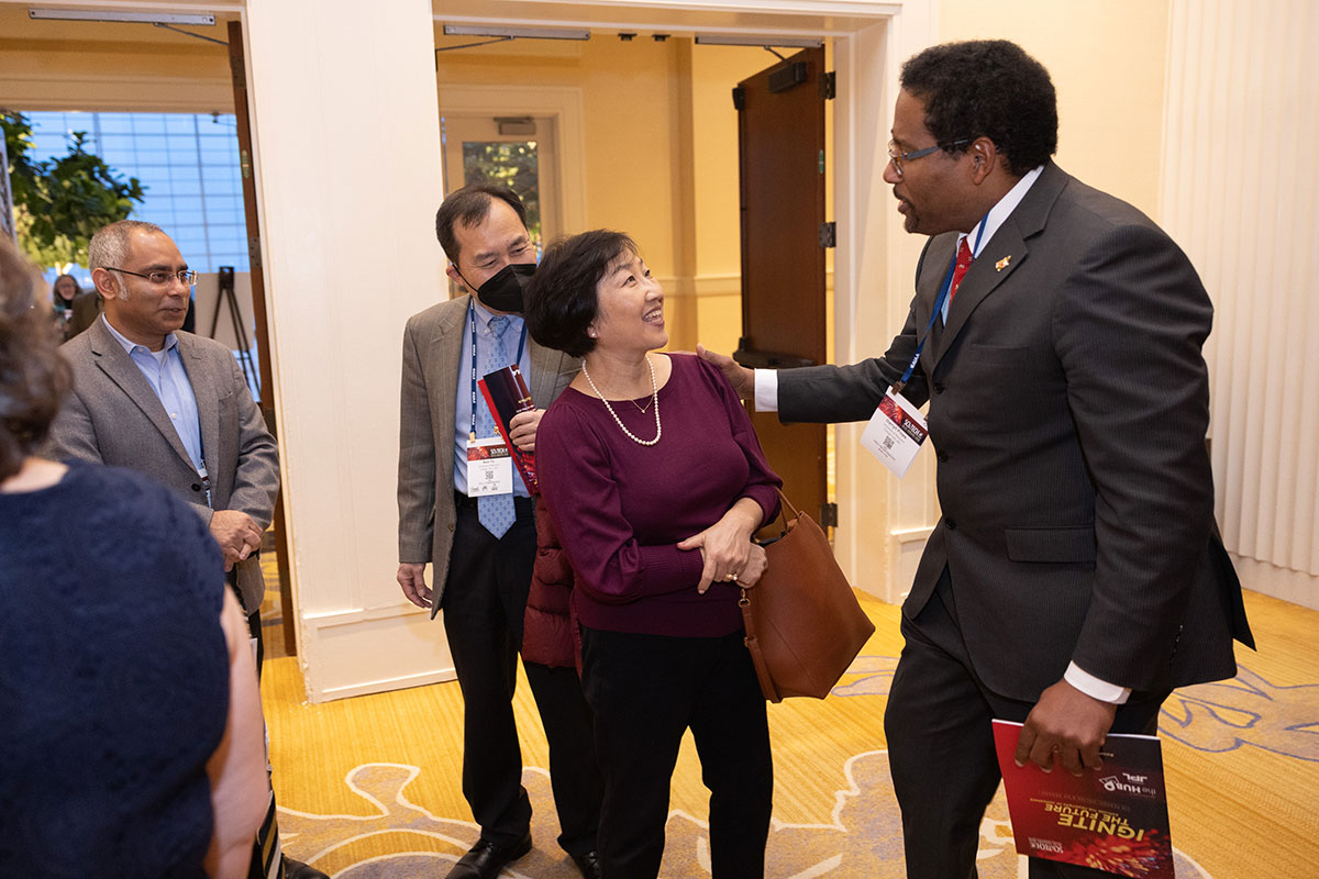 Attendees greet one another at the 2023 AIAA SciTech Forum