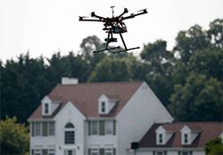 Drone_Over_Neighborhood2_AP_Purchased-250